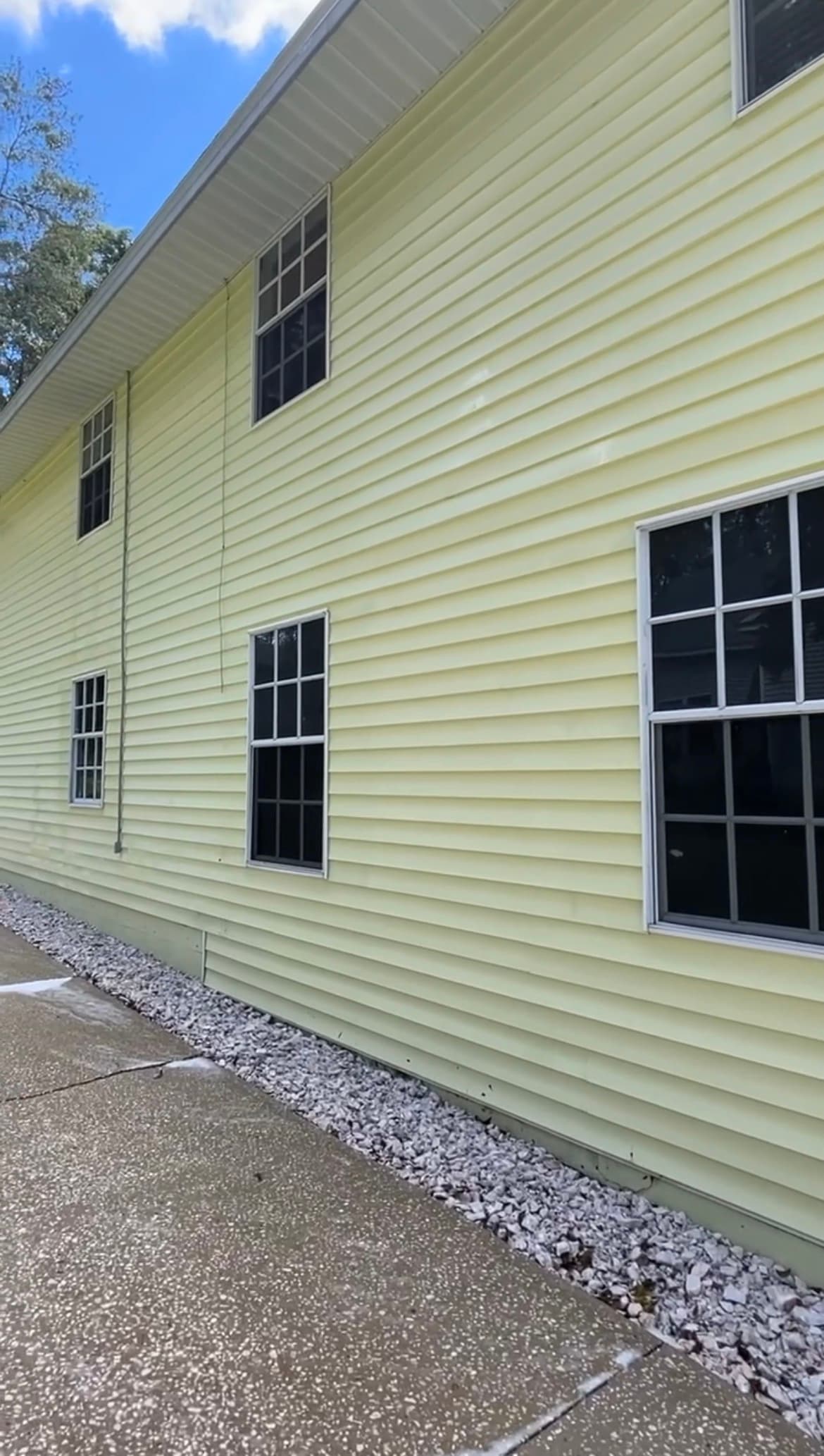 Clean commercial building siding after pressure washing by Black Lab Power Wash in Brooksville FL